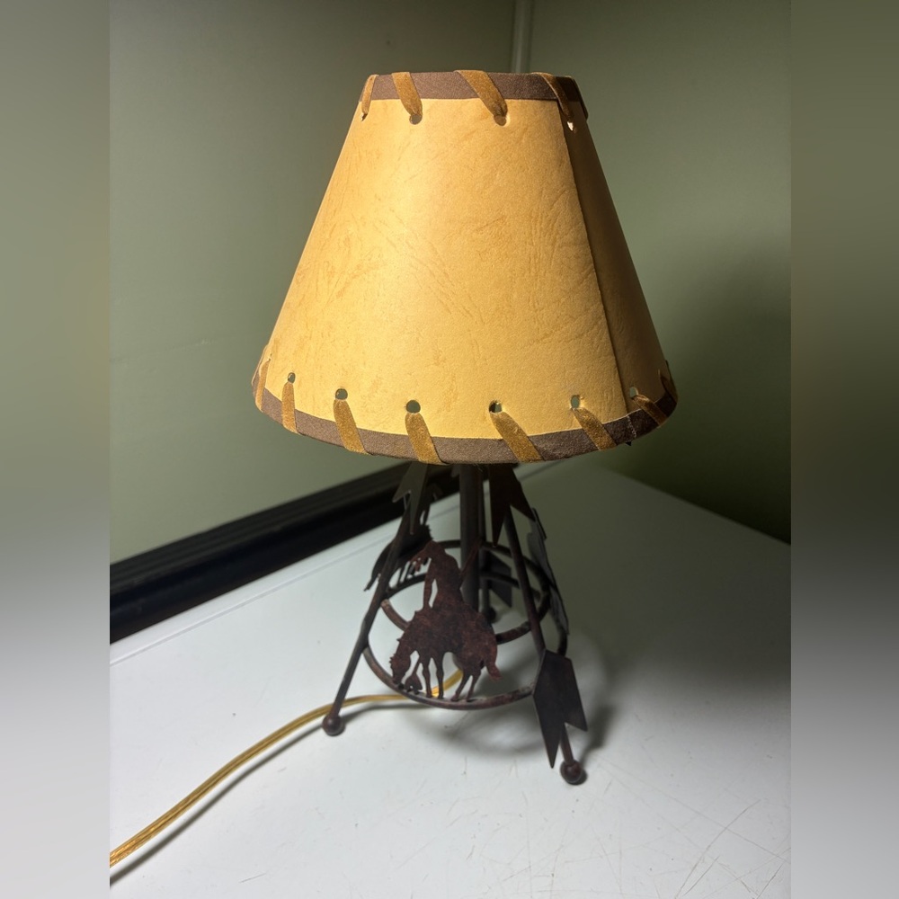 vintage metal cut table lamp featuring a rustic Southwestern or indian theme